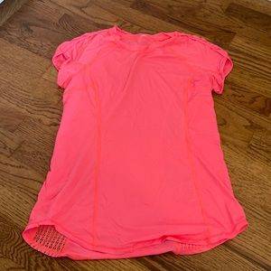 Bright pink Lululemon lightweight shirt
